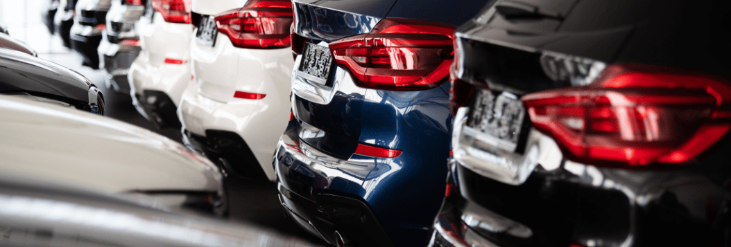 Row of cars at auto dealership