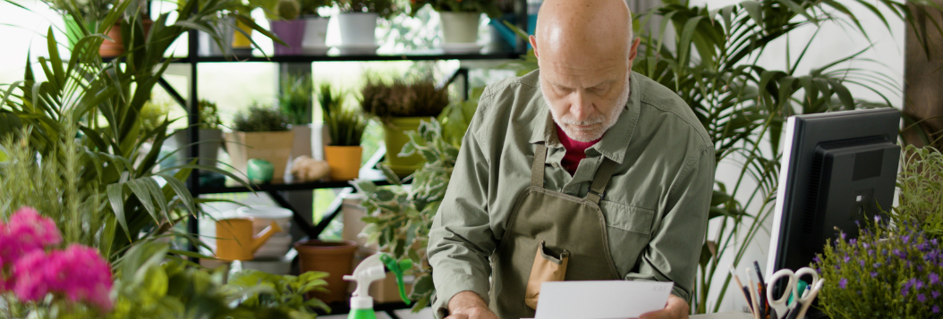 man working in a gardening shop