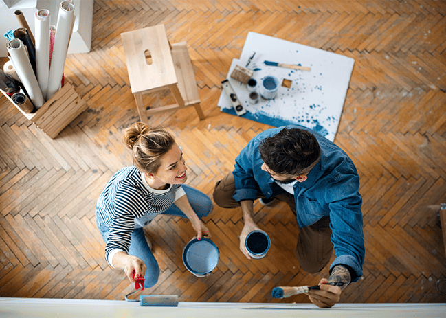 Man and Woman Painting Home