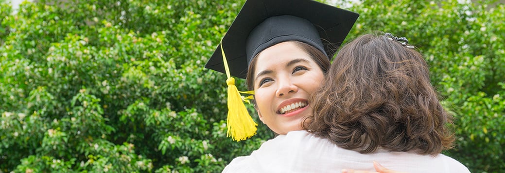 college grad hugging mom