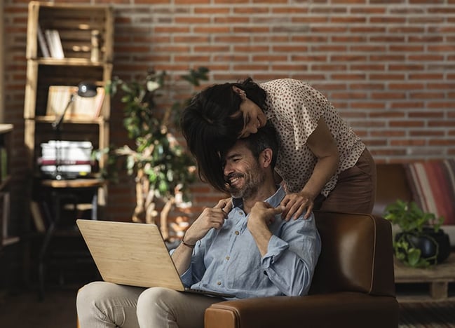 middle aged couple relaxing at home