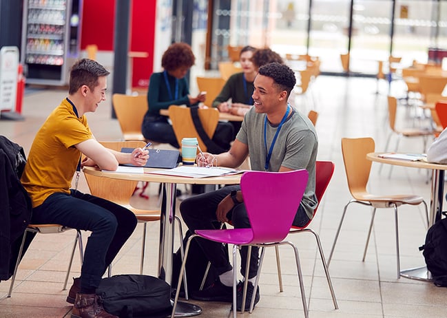 communal area of busy college campus-with-students