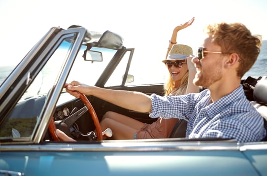 couple-enjoying-convertible-car-ride-near-ocean-2026-01-09-09-38-48-utc