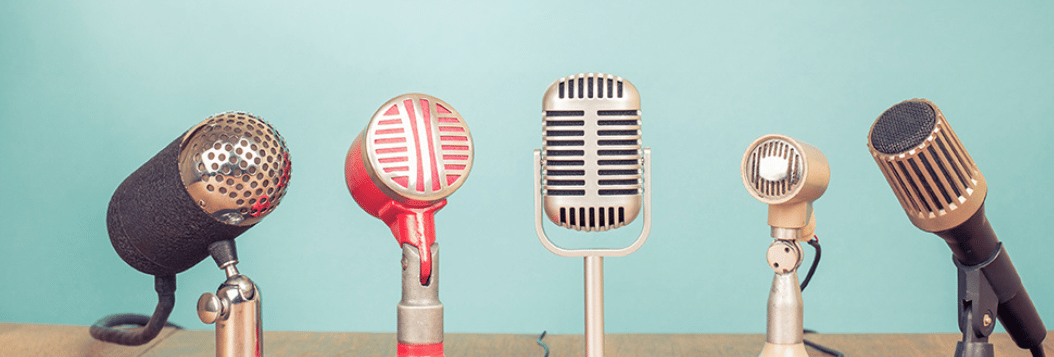 Group of retro microphones on tabletop