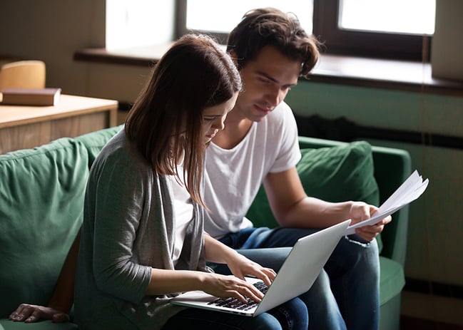 couple reviewing credit report together