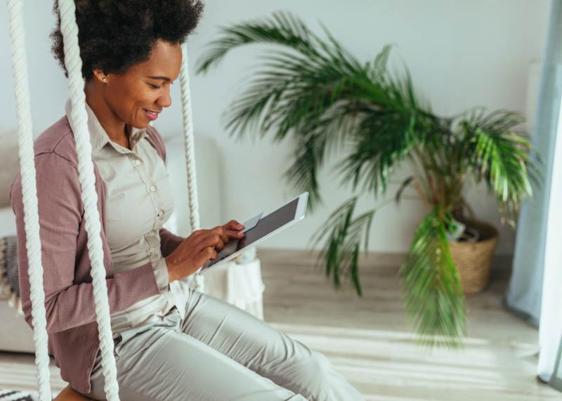 woman viewing bank accounts on ipad