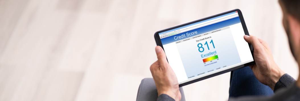 man viewing credit score on mobile device
