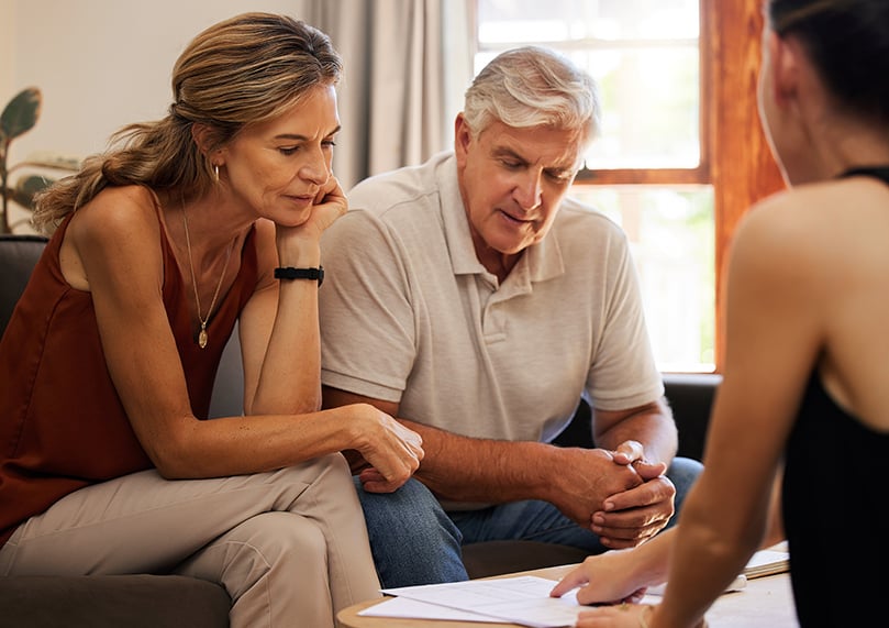 couple discussing retirement planning with financial advisor